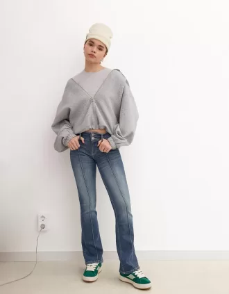 Blugi bootcut cu talie joasă