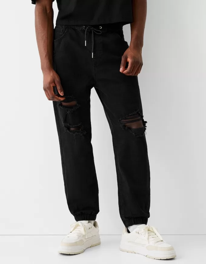 Blugi jogger rupți Blugi jogger rupți