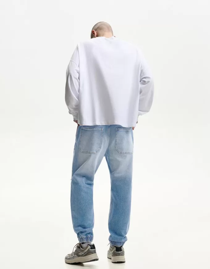 Blugi jogger rupți Blugi jogger rupți