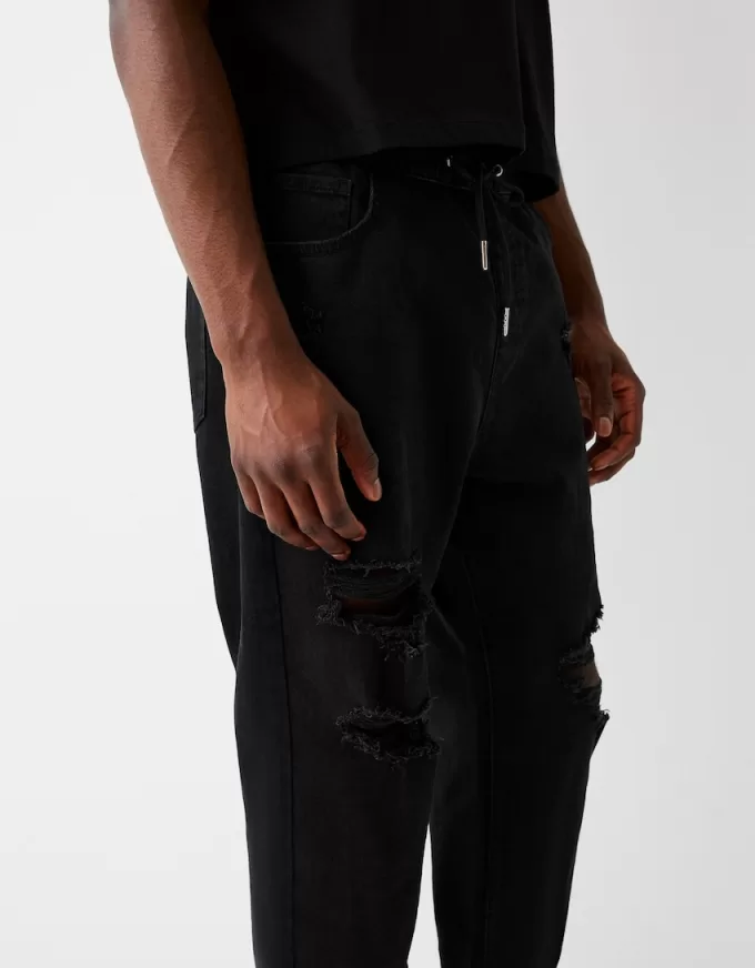 Blugi jogger rupți Blugi jogger rupți