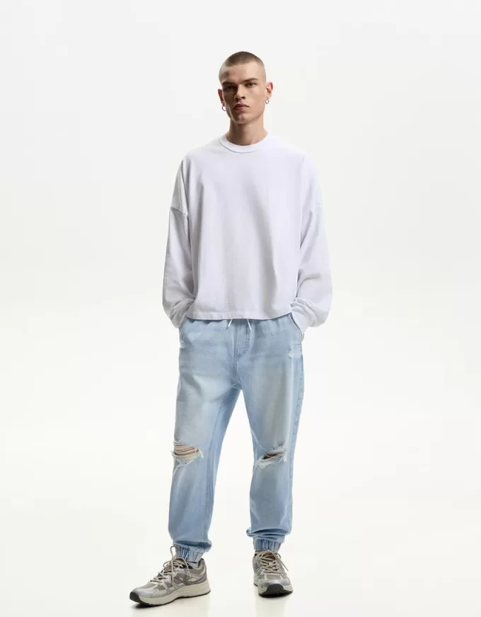Blugi jogger rupți Blugi jogger rupți