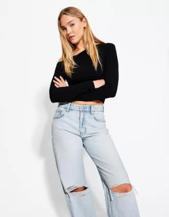 Blugi rupți cu picioare largi din anii ’90