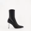 Botine metalice montate cu toc înalt Botine metalice montate cu toc înalt