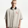 Camasa boxy cu maneca scurta brodata Camasa boxy cu maneca scurta brodata
