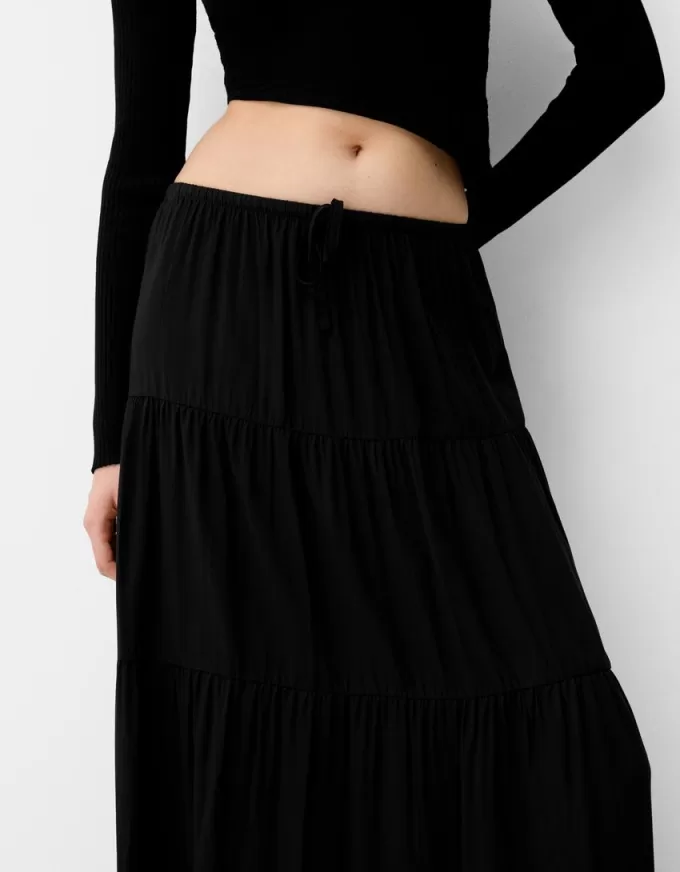 Fusta midi cu talie elastica Fusta midi cu talie elastica