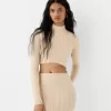Fusta midi din tricot cablu Fusta midi din tricot cablu