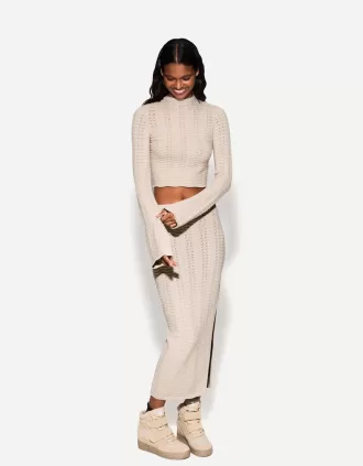 Fusta midi din tricot deschis
