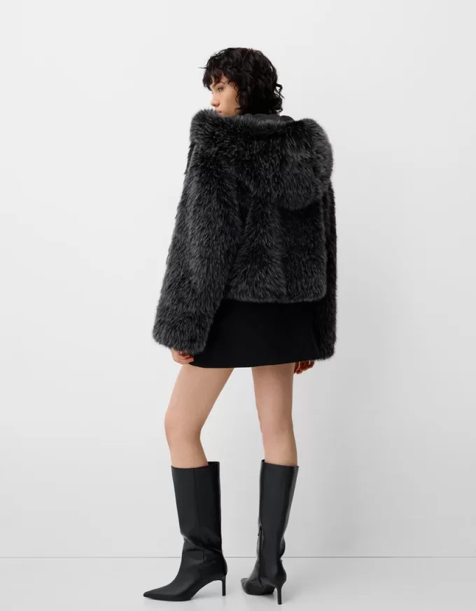 Fusta mini cu pliuri cutie cu detaliu fundita Fusta mini cu pliuri cutie cu detaliu fundita