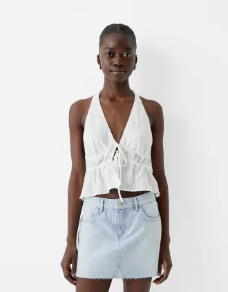 Fusta mini din denim cu stras