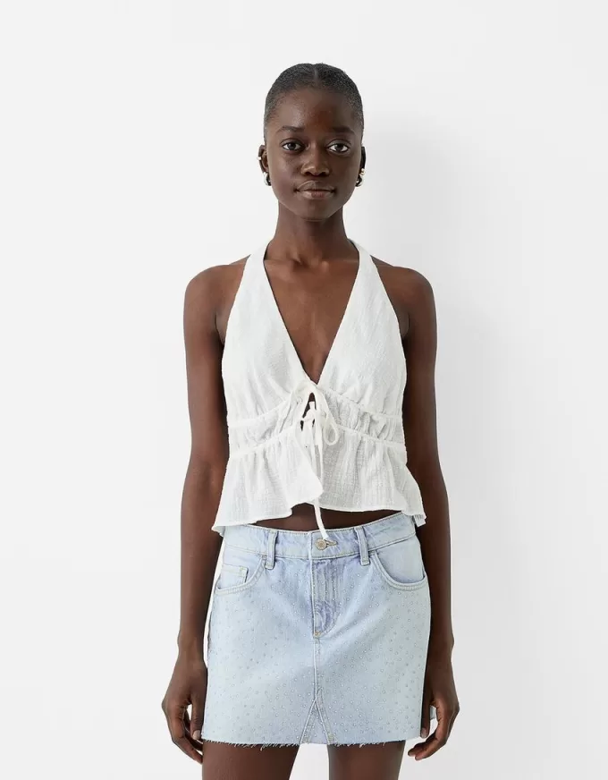 Fusta mini din denim cu stras Fusta mini din denim cu stras