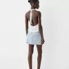 Fusta mini din denim cu stras Fusta mini din denim cu stras
