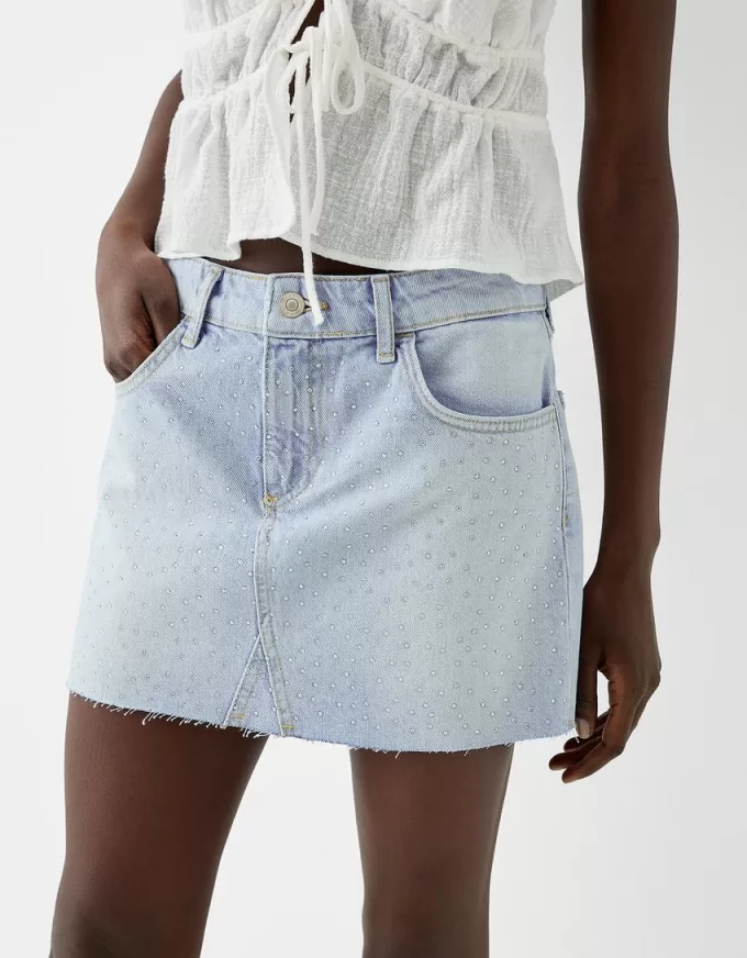 Fusta mini din denim cu stras Fusta mini din denim cu stras