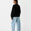 Hanorac oversize cu buzunare laterale Hanorac oversize cu buzunare laterale