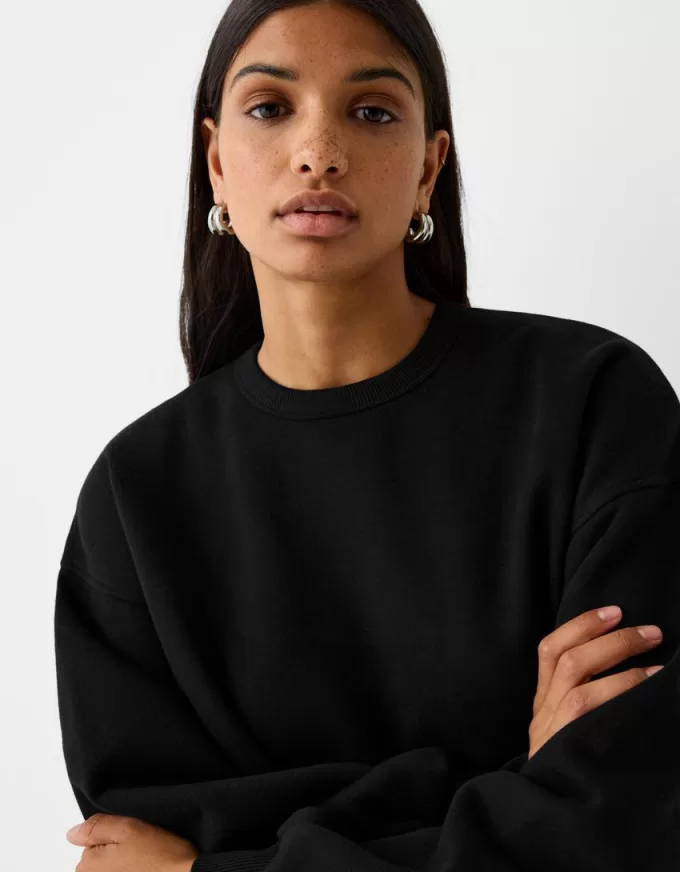 Hanorac oversize cu buzunare laterale Hanorac oversize cu buzunare laterale