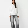 Hanorac oversize cu buzunare laterale Hanorac oversize cu buzunare laterale