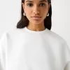 Hanorac oversize cu buzunare laterale Hanorac oversize cu buzunare laterale