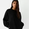 Hanorac oversize cu buzunare laterale Hanorac oversize cu buzunare laterale