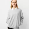 Hanorac oversize cu buzunare laterale Hanorac oversize cu buzunare laterale
