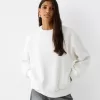 Hanorac oversize cu buzunare laterale Hanorac oversize cu buzunare laterale