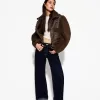 Jachetă cu două fețe, cu mâneci din imitație de shearling Jachetă cu două fețe, cu mâneci din imitație de shearling