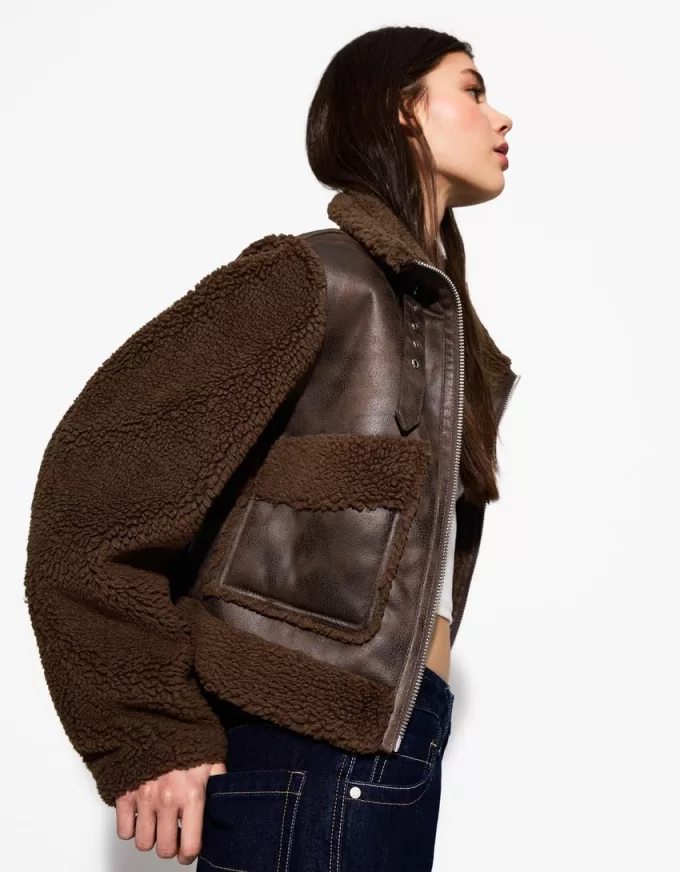 Jachetă cu două fețe, cu mâneci din imitație de shearling Jachetă cu două fețe, cu mâneci din imitație de shearling