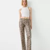 Pantaloni animal print cu efect de piele Pantaloni animal print cu efect de piele