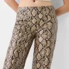 Pantaloni animal print cu efect de piele Pantaloni animal print cu efect de piele