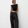 Pantaloni croiți