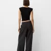 Pantaloni croiți