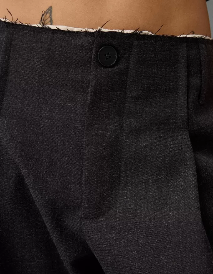 Pantaloni croiți