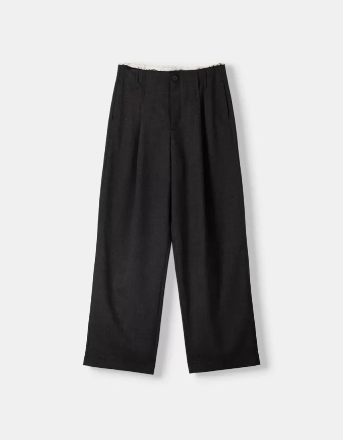 Pantaloni croiți