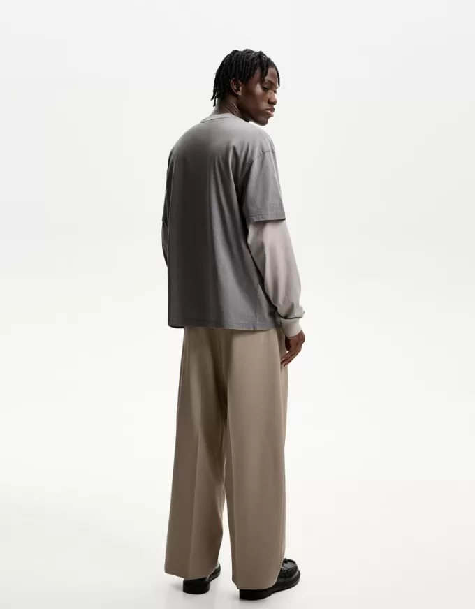 Pantaloni croiți super largi