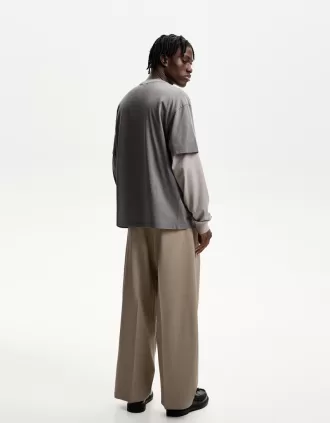 Pantaloni croiți super largi
