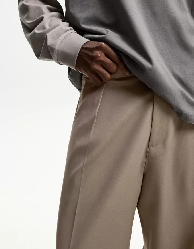 Pantaloni croiți super largi