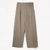 Pantaloni croiți super largi