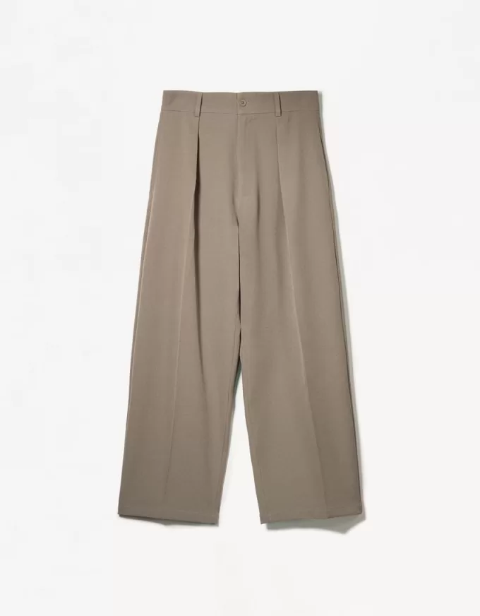Pantaloni croiți super largi