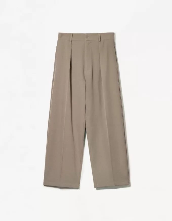 Pantaloni croiți super largi