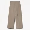 Pantaloni croiți super largi