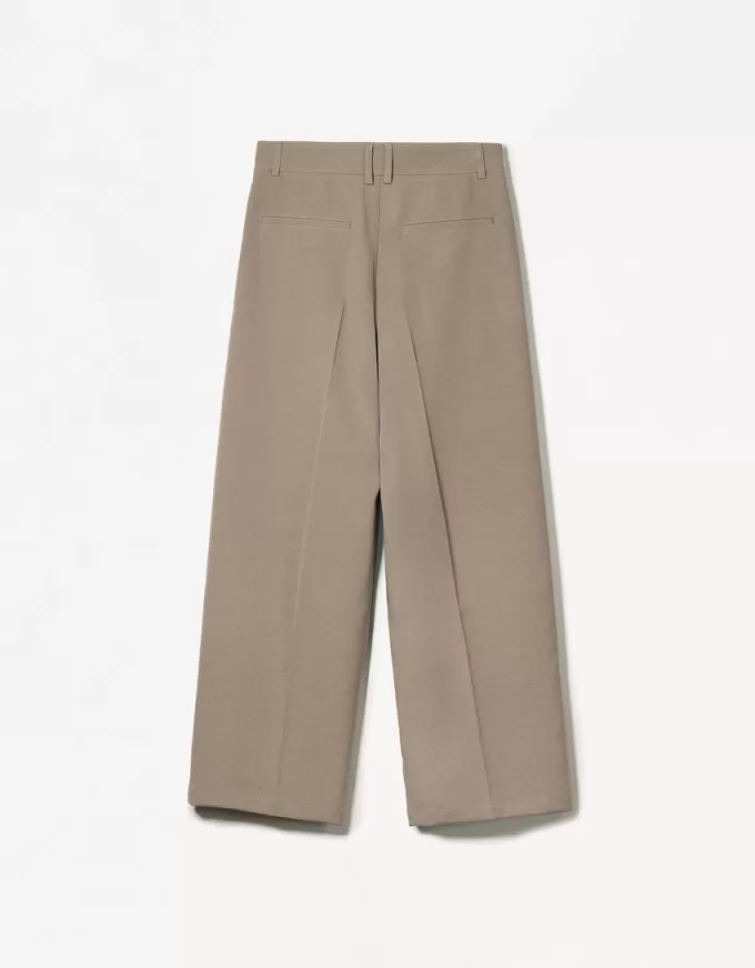 Pantaloni croiți super largi