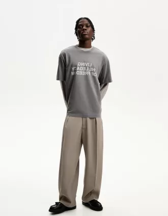 Pantaloni croiți super largi