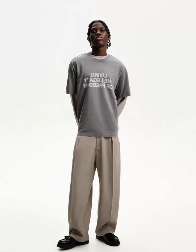 Pantaloni croiți super largi