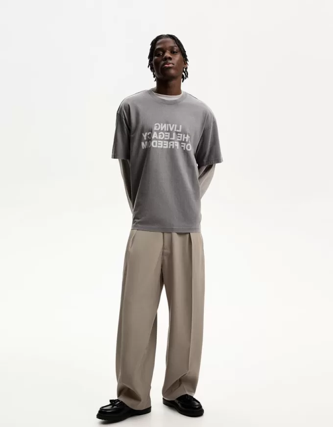 Pantaloni croiți super largi