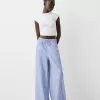 Pantaloni cu dungi late cu efect sifonat Pantaloni cu dungi late cu efect sifonat