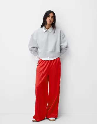 Pantaloni cu dungi laterale
