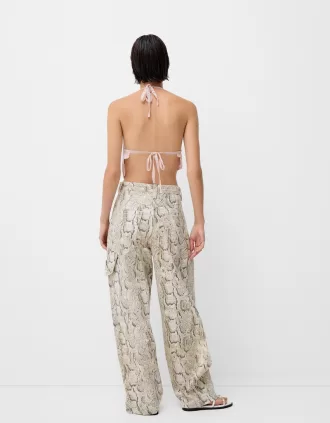 Pantaloni de dulgher cu imprimeu animal