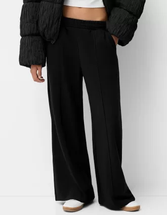Pantaloni de trening cu picioare largi