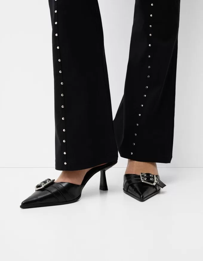 Pantaloni evazați cu șuruburi