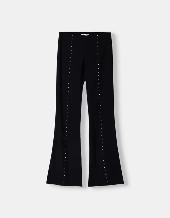 Pantaloni evazați cu șuruburi