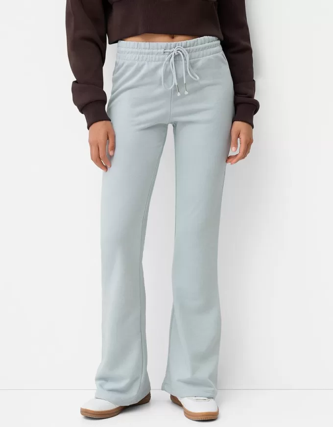 Pantaloni evazați de pluș Pantaloni evazați de pluș