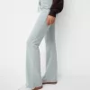 Pantaloni evazați de pluș Pantaloni evazați de pluș